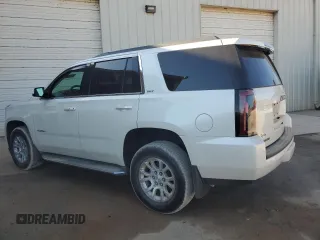 2015 GMC Yukon SLT with VIN 1GKS1BKCXFR563509, listed as a Copart auction lot 77188854 with 127,481 mi miles and Clean Title. Bid and sale history available at carsss.com. Image 2.