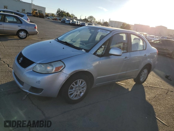 2012 Suzuki SX4 LE with VIN JS2YC5A33C6301529, listed as a Copart auction lot 79363394 with 72,348 mi miles and Clean Title. Bid and sale history available at carsss.com. Image 1.