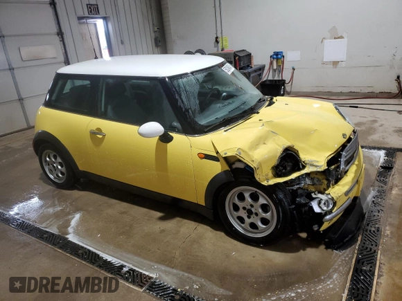 2002 MINI Hardtop z VIN WMWRC33412TE12203, wystawiony jako Copart lot #58246045 z przebiegiem 132 506 mil mil oraz Szkoda całkowita • Salvage title. Historia ofert i sprzedaży dostępna na DreamBid. Obrazek 4.