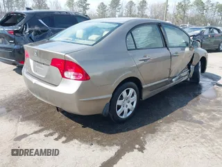 2006 Honda Civic LX with VIN 2HGFA16596H514483, listed as a IAAI auction lot 41889508 with 148,412 mi miles and . Bid and sale history available at DreamBid. Image 4.