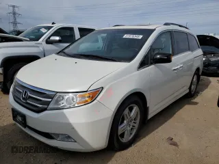 2013 Honda Odyssey Touring with VIN 5FNRL5H9XDB037076, listed as a Copart auction lot 51978345 with 145,897 mi miles and Salvage Title. Bid and sale history available at carsss.com. Image 1.