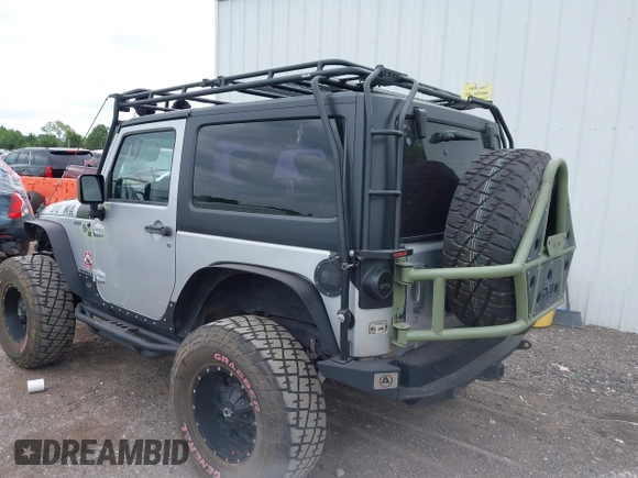 2007 Jeep Wrangler X with VIN 1J4FA24117L142513, listed as a IAAI auction lot 42314284 with 70,213 mi miles and . Bid and sale history available at DreamBid. Image 3.