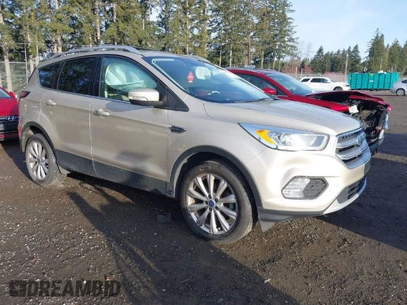 2017 Ford Escape Titanium with VIN 1FMCU0JD0HUB79739, listed as a IAAI auction lot 41807975 with 121,902 mi miles. Bid and sale history available at carsss.com. Image 1.