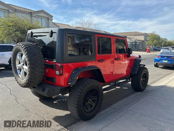 2018 Jeep Wrangler JK Unlimited Sport S with VIN 1C4BJWDG7JL828871, listed as a Copart auction lot 87530425 with 60,958 mi miles and Clean Title. Bid and sale history available at carsss.com. Image 4.