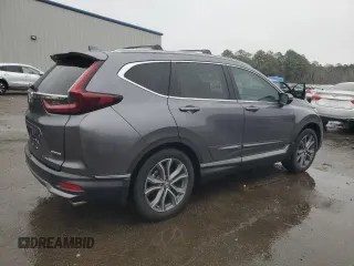 2021 Honda CR-V Touring with VIN 2HKRW1H96MH420465, listed as a Copart auction lot 86885384 with 61,699 mi miles and Salvage Title. Bid and sale history available at carsss.com. Image 3.