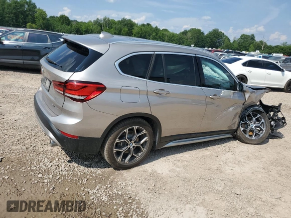 2021 BMW X1 xDrive28i with VIN WBXJG9C09M5S52289, listed as a Copart auction lot 64413105 with Not provided miles and Salvage title. Bid and sale history available at DreamBid. Image 3.
