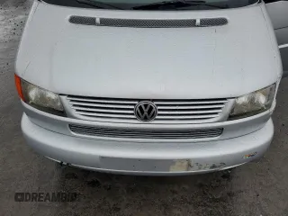 2003 Volkswagen EuroVan с VIN WV2KB47093H041606, выставлен на аукционе Copart как лот 73808224 с пробегом 228 496 миль миль и Чистый • Clean title. История ставок и продаж доступна на DreamBid. Изображение 12.