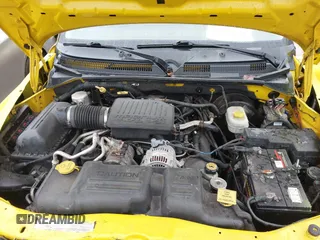 2004 Dodge Dakota Sport z VIN 1D7HG38N64S752270, wystawiony jako IAAI lot #41555599 z przebiegiem 121 283 mil mil oraz . Historia ofert i sprzedaży dostępna na DreamBid. Obrazek 10.