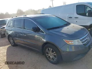 2012 Honda Odyssey EX-L with VIN 5FNRL5H63CB006272, listed as a IAAI auction lot 42074163 with 187,785 mi miles and . Bid and sale history available at carsss.com. Image 13.