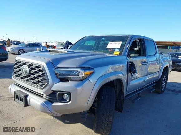 2020 Toyota Tacoma 2WD SR5 with VIN 3TMAZ5CN2LM120124, listed as a IAAI auction lot 41720985 with 79,801 mi miles. Bid and sale history available at carsss.com. Image 2.