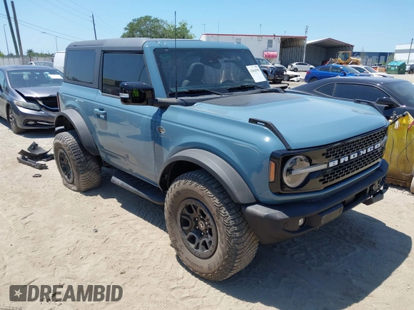 2021 Ford Bronco z VIN 1FMDE5CP5MLA98340, wystawiony jako IAAI lot #42064998 z przebiegiem 38 569 mil mil oraz . Historia ofert i sprzedaży dostępna na DreamBid. Obrazek 1.