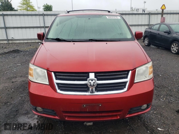 2010 Dodge Grand Caravan SXT z VIN 2D4RN5D10AR179773, wystawiony jako Copart lot #56855235 z przebiegiem 239 925 mil mil oraz Nie do naprawy • Non repairable. Historia ofert i sprzedaży dostępna na DreamBid. Obrazek 5.