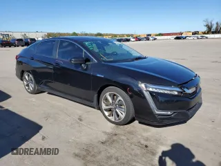 2018 Honda Clarity with VIN JHMZC5F1XJC011632, listed as a Copart auction lot 71693242 with 137,475 mi miles. Bid and sale history available at carsss.com. Image 4.