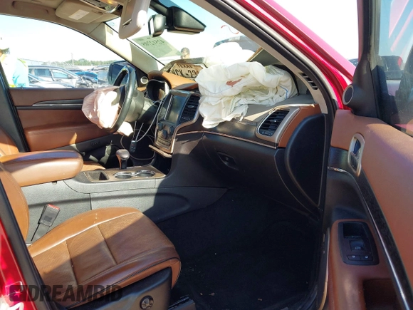2015 Jeep Grand Cherokee Summit with VIN 1C4RJEJG9FC100568, listed as a IAAI auction lot 42512705 with 128,413 mi miles and . Bid and sale history available at DreamBid. Image 5.