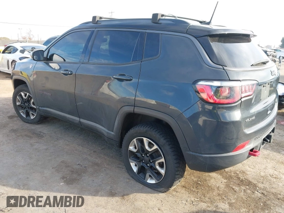 2017 Jeep Compass Trailhawk with VIN 3C4NJDDBXHT657425, listed as a IAAI auction lot 41022289 with 83,003 mi miles and . Bid and sale history available at DreamBid. Image 3.