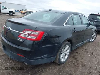 2014 Ford Taurus SEL with VIN 1FAHP2E80EG114996, listed as a IAAI auction lot 41908983 with 136,864 mi miles. Bid and sale history available at carsss.com. Image 4.