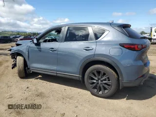 2024 Mazda CX-5 2.5 S Carbon Edition with VIN JM3KFBCL6R0422979, listed as a Copart auction lot 50939695 with 9,974 mi miles and Salvage Title. Bid and sale history available at carsss.com. Image 2.