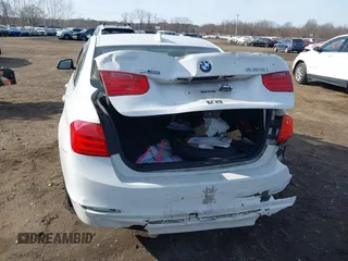 2014 BMW 3 Series 335i xDrive with VIN WBA3B9C52EJ466045, listed as a IAAI auction lot 41281384 with 136,329 mi miles. Bid and sale history available at carsss.com. Image 16.