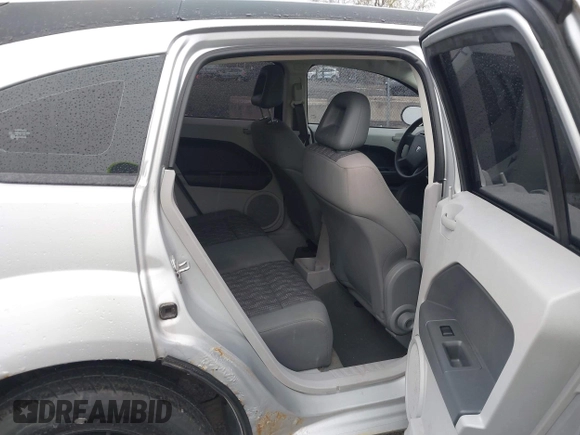 2007 Dodge Caliber SXT with VIN 1B3HB48BX7D379555, listed as a IAAI auction lot 42022554 with 99,670 mi miles and . Bid and sale history available at DreamBid. Image 8.