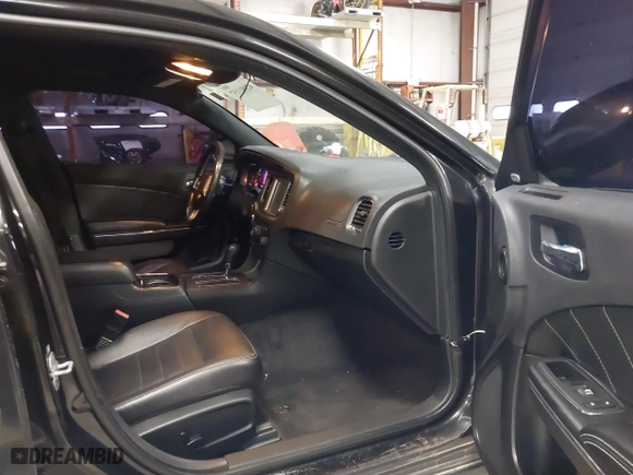 2011 Dodge Charger Road/Track with VIN 2B3CL5CT9BH511648, listed as a IAAI auction lot 42001157 with 103,223 mi miles. Bid and sale history available at carsss.com. Image 5.