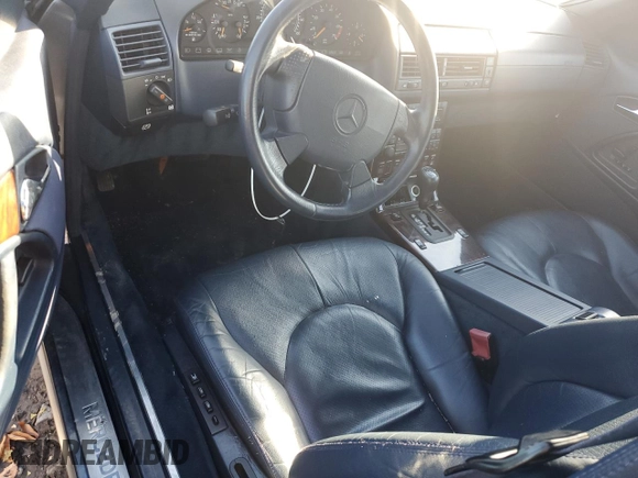 1998 Mercedes-Benz SL-Class with VIN WDBFA67F2WF170899, listed as a Copart auction lot 84813814 with 88,997 mi miles and Salvage Title. Bid and sale history available at carsss.com. Image 8.