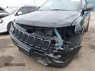 2021 Jeep Grand Cherokee Trailhawk with VIN 1C4RJFLT4MC771773, listed as a IAAI auction lot 42063954 with 17,920 mi miles and . Bid and sale history available at DreamBid. Image 6.