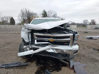 2014 Chevrolet Silverado 1500 LT with VIN 1GCVKREC2EZ390061, listed as a IAAI auction lot 40824477 with 140,928 mi miles and . Bid and sale history available at DreamBid. Image 12.