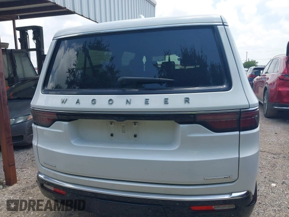 2023 Jeep Wagoneer Series III z VIN 1C4SJSDP5PS540838, wystawiony jako IAAI lot #42759405 z przebiegiem 72 439 mil mil oraz . Historia ofert i sprzedaży dostępna na DreamBid. Obrazek 16.