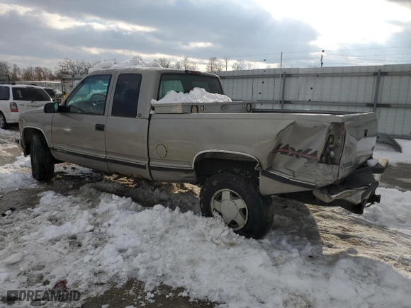 1999 GMC Sierra Classic 1500 with VIN 1GTEK19R2XR515563, listed as a Copart auction lot 41599675 with 230144 miles and Salvage Title. Bid and sale history available at carsss.com. Image 2.