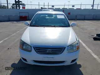 2009 Kia Spectra LX z VIN KNAFE222995623894, wystawiony jako IAAI lot #42385181 z przebiegiem 119 030 mil mil oraz . Historia ofert i sprzedaży dostępna na DreamBid. Obrazek 12.