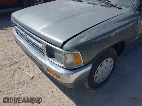 1993 Toyota Pickup DLX z VIN JT4RN93P3P5069851, wystawiony jako IAAI lot #41950116 z przebiegiem 209 937 mil mil oraz . Historia ofert i sprzedaży dostępna na DreamBid. Obrazek 14.