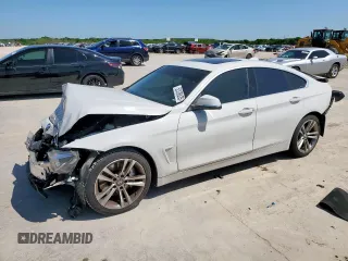 2018 BMW 4 Series 440i with VIN WBA4J5C52JBF06647, listed as a Copart auction lot 52539535 with 164,740 mi miles and Salvage title. Bid and sale history available at DreamBid. Image 1.