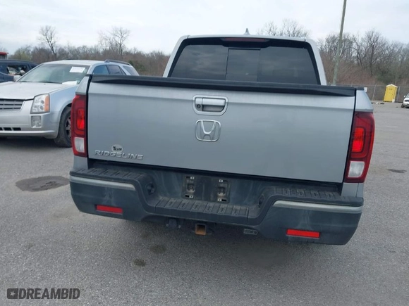 2019 Honda Ridgeline RTL with VIN 5FPYK2F50KB004055, listed as a IAAI auction lot 41576975 with 128,620 mi miles. Bid and sale history available at carsss.com. Image 16.