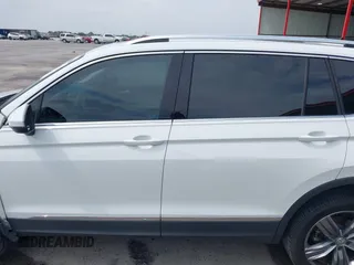 2020 Volkswagen Tiguan SE z VIN 3VV3B7AX4LM032609, wystawiony jako IAAI lot #42074359 z przebiegiem 52 404 mil mil oraz . Historia ofert i sprzedaży dostępna na DreamBid. Obrazek 14.