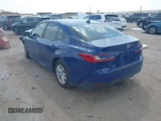 2025 Toyota Camry LE with VIN 4T1DAACK0SU091506, listed as a IAAI auction lot 41880460 with 8,407 mi miles and . Bid and sale history available at DreamBid. Image 3.