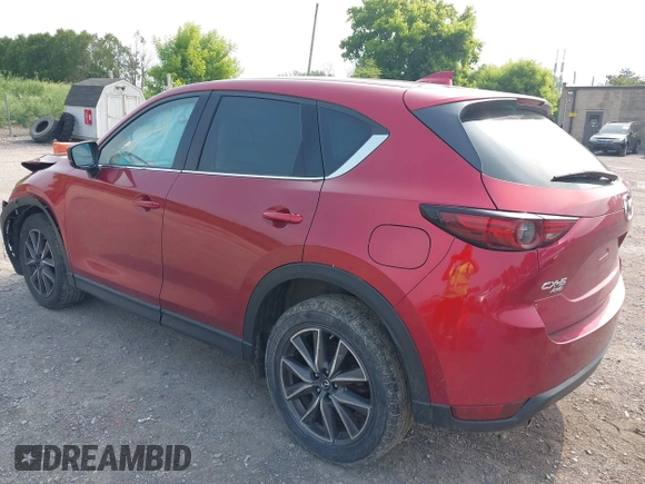 2018 Mazda CX-5 Grand Touring with VIN JM3KFBDM2J0448555, listed as a IAAI auction lot 42449282 with 65,770 mi miles and . Bid and sale history available at DreamBid. Image 3.