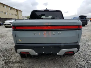 2022 Rivian R1T Launch Edition z VIN 7FCTGAALXNN004228, wystawiony jako Copart lot #43226985 z przebiegiem 4 mil mil oraz Szkody całkowita. Historia ofert i sprzedaży dostępna na DreamBid. Obrazek 6.