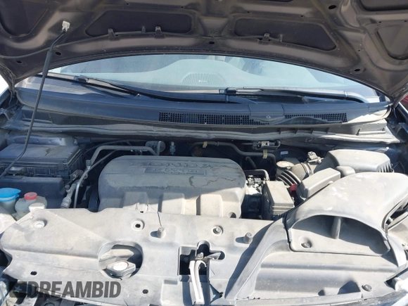 2015 Honda Odyssey LX with VIN 5FNRL5H29FB032327, listed as a IAAI auction lot 42052043 with 153,365 mi miles and . Bid and sale history available at DreamBid. Image 10.