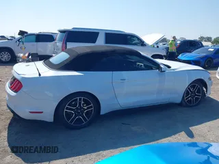 2020 Ford Mustang EcoBoost z VIN 1FATP8UH0L5105965, wystawiony jako IAAI lot #42475841 z przebiegiem 68 999 mil mil oraz . Historia ofert i sprzedaży dostępna na DreamBid. Obrazek 14.
