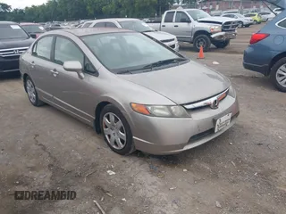 2006 Honda Civic LX with VIN 1HGFA16596L044829, listed as a IAAI auction lot 42643798 with 271,213 mi miles and . Bid and sale history available at DreamBid. Image 1.