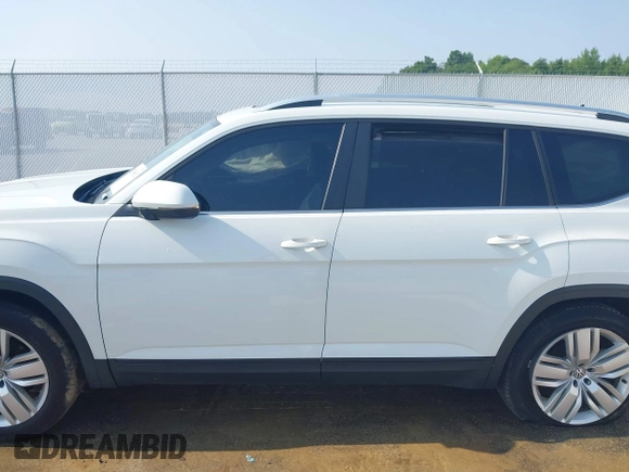 2019 Volkswagen Atlas SE with VIN 1V2UR2CA6KC549094, listed as a IAAI auction lot 42385802 with 61,718 mi miles and . Bid and sale history available at DreamBid. Image 14.