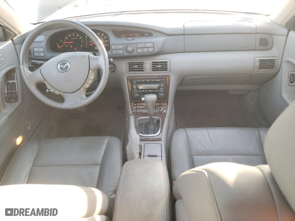 2002 Mazda Millenia with VIN JM1TA221021729625, listed as a Copart auction lot 87304234 with NaN miles and Salvage Title. Bid and sale history available at carsss.com. Image 8.