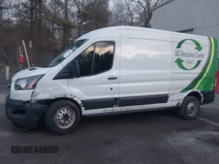 2020 Ford Transit Cargo z VIN 1FTBR2C87LKA34635, wystawiony jako IAAI lot #41201981 z przebiegiem 89 814 mil mil oraz . Historia ofert i sprzedaży dostępna na DreamBid. Obrazek 14.