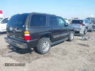 2004 Chevrolet Tahoe LS with VIN 1GNEC13V04R178784, listed as a IAAI auction lot 42013755 with 126,162 mi miles. Bid and sale history available at carsss.com. Image 4.