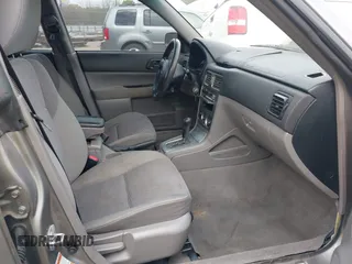 2006 Subaru Forester 2.5 X with VIN JF1SG63696H723272, listed as a IAAI auction lot 41908094 with 220,640 mi miles. Bid and sale history available at carsss.com. Image 5.