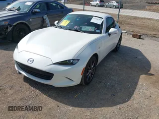 2020 Mazda MX-5 Miata Grand Touring с VIN JM1NDAM73L0414658, выставлен на аукционе IAAI как лот 42451595 с пробегом 73 339 миль миль и . История ставок и продаж доступна на DreamBid. Изображение 17.