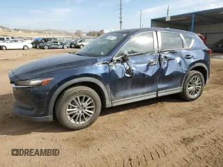 2017 Mazda CX-5 Touring z VIN JM3KFBCL7H0212955, wystawiony jako Copart lot #46096525 z przebiegiem 94 606 mil mil oraz Szkody całkowita. Historia ofert i sprzedaży dostępna na DreamBid. Obrazek 1.