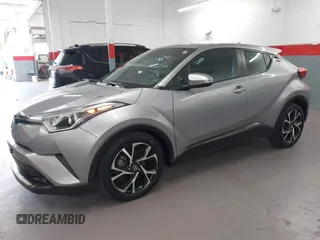 2018 Toyota C-HR XLE z VIN NMTKHMBX0JR015680, wystawiony jako IAAI lot #41987642 z przebiegiem 80 367 mil mil oraz . Historia ofert i sprzedaży dostępna na DreamBid. Obrazek 6.