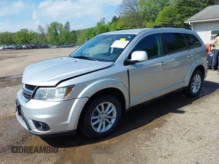 2013 Dodge Journey SXT z VIN 3C4PDCBG4DT564290, wystawiony jako IAAI lot #42225485 z przebiegiem 69 029 mil mil oraz . Historia ofert i sprzedaży dostępna na DreamBid. Obrazek 2.