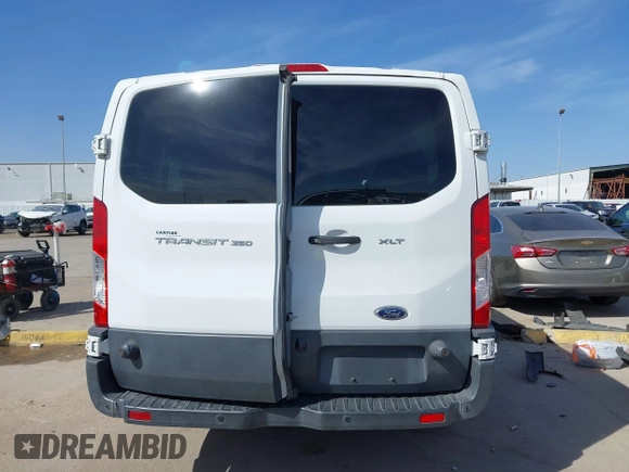 2018 Ford Transit Passenger XL with VIN 1FBZX2YM0JKA87639, listed as a IAAI auction lot 38957868 with Not provided miles and . Bid and sale history available at DreamBid. Image 16.